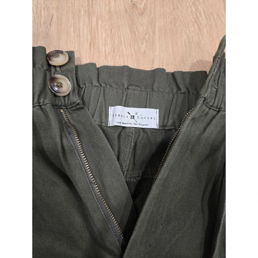 Rebels & Lovers casual pants featuring a flattering paperbag high-rise waist....